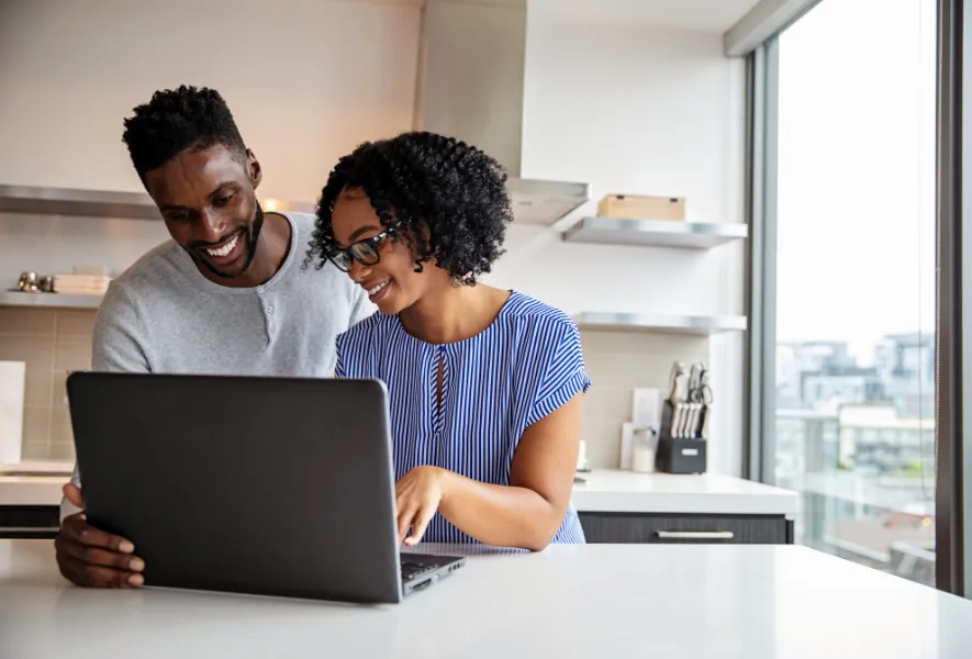 millennial couple learning about mortgage